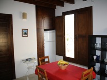 Kitchen/diner with doors onto terrace